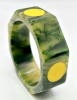BB469 octagon shaped inkspot bakelite bangle with yellow dots